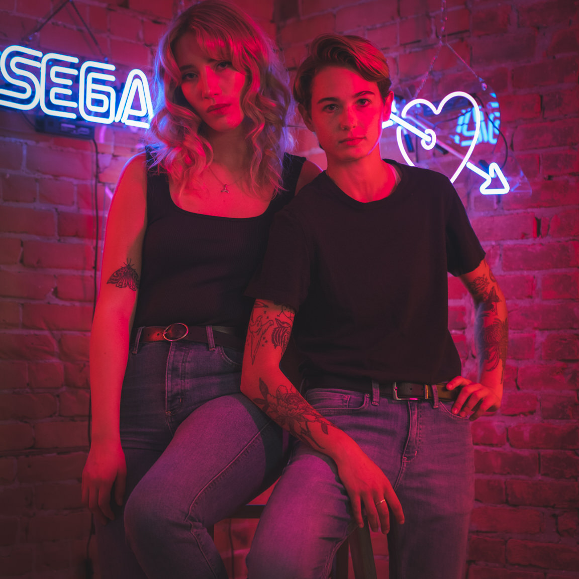 couple at neon signs at snap foto club