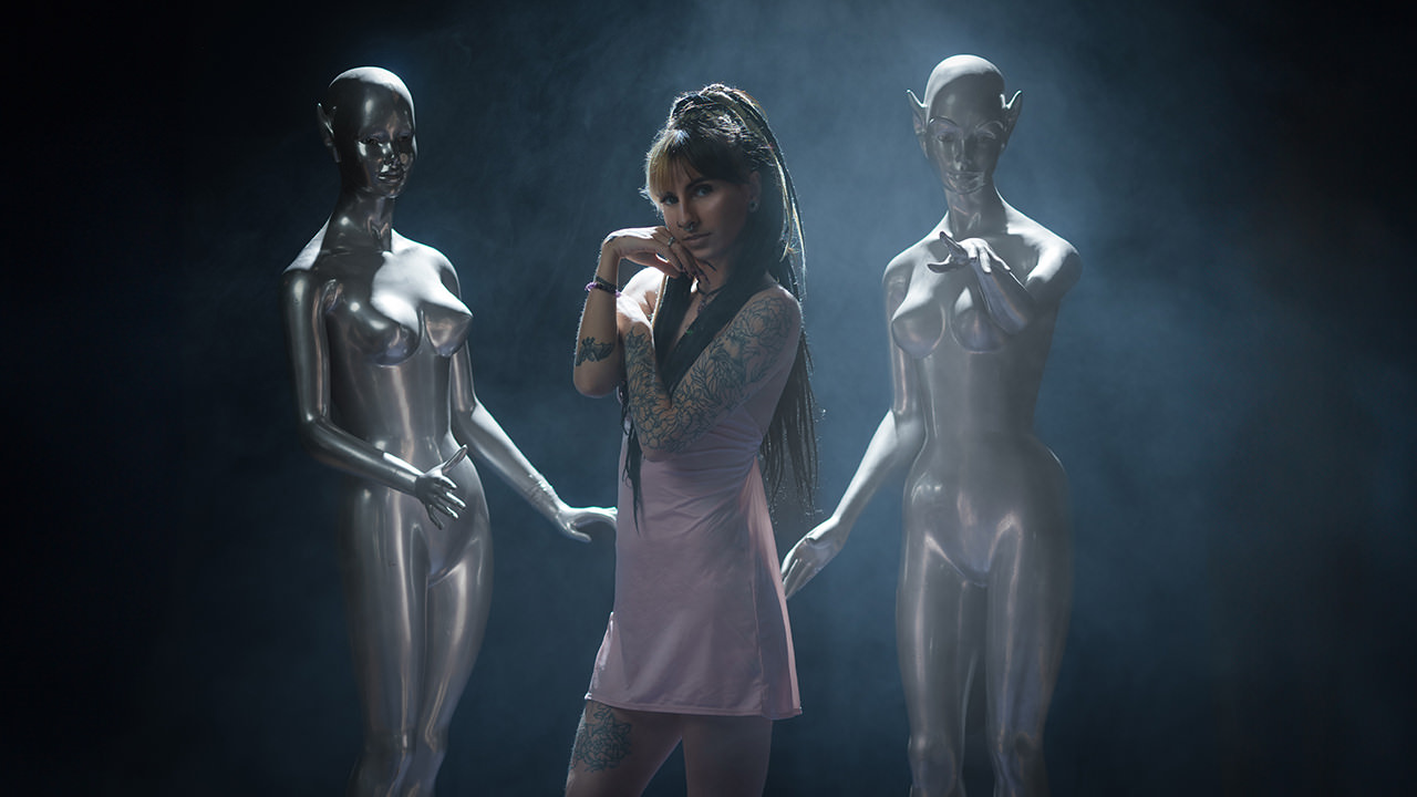 model with aliens posing